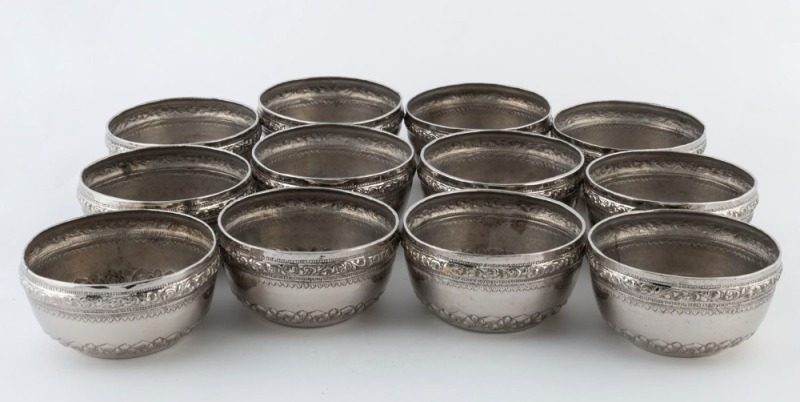 Set of 12 Burmese silver plated finger bowls, 20th century, ​​​​​​​6cm high, 10cm wide