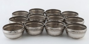 Set of 12 Burmese silver plated finger bowls, 20th century, ​​​​​​​6cm high, 10cm wide