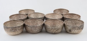 Set of ten Burmese coin silver finger bowls, 20th century, ​​​​​​​6cm high, 12cm wide, 980 grams total