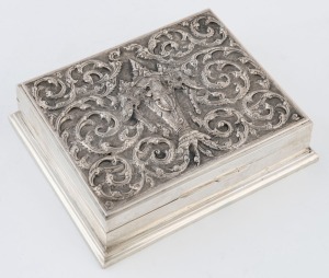 A silver playing card box with elephant decoration, interior lined with cedar, 20th century, stamped "Sterling Siam", 13.5cm wide.