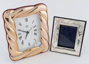 A silver framed clock and a silver picture frame, 20th century, (2 items), the larger 18.5cm high