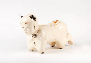 A Cizhou boy pillow in the Ming style, 22cm high, 36cm wide
