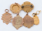 Assorted antique 9ct gold fobs, mainly sporting, plus military, early 20th century, (6 items), 29.5 grams total - 2