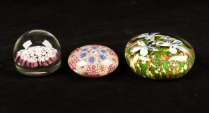 Three assorted antique and vintage paperweights, the largest 8cm wide