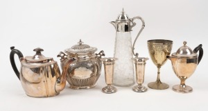 A pair of sterling silver vases with weighted bases, a silver plated claret jug with fern etched decoration, silver plated goblet, biscuit barrel, teapot and hot water pot, 19th and 20th century, (7 items), ​​​​​​​29cm high