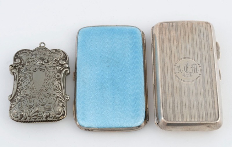 An antique Continental silver and blue enamel cigarette case, together with an English sterling silver cigarette case and a match vesta, 19th/20th century, (3 items), the enamel piece 8.5cm long, 180 grams total