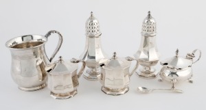 Sterling silver condiments, sugar casters, spoon and christening mug, (7 items), the sugar castors 11.5cm high, 450 grams total