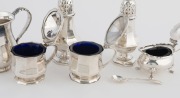 Sterling silver condiments, sugar casters, spoon and christening mug, (7 items), the sugar castors 11.5cm high, 450 grams total - 2