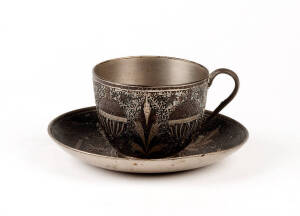 An Indo-Persian damascened cup and saucer, circa 1900, 17cm diameter
