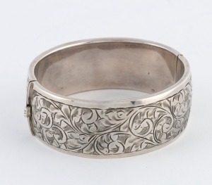 An antique sterling silver bangle with engraved decoration, made in Birmingham, circa 1922