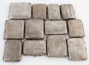 Twelve assorted sterling silver cigarette cases, early 20th century, ​​​​​​​the largest 9.5cm wide, 818 grams total