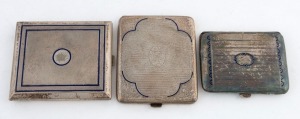 Three assorted silver cigarette cases with blue enamel decoration, early 20th century, the largest 10cm wide, 386 grams total