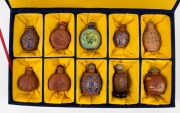 Ten assorted Chinese snuff bottles, housed in a fitted blue and yellow cloth covered box, ​​​​​​​the box 35cm wide - 3