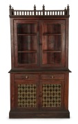 A Colonial bookcase with original crocodile crackle glaze finish, kauri pine with red pine secondaries, South Australian origin, circa 1860, 235cm high, 128cm wide, 50cm deep