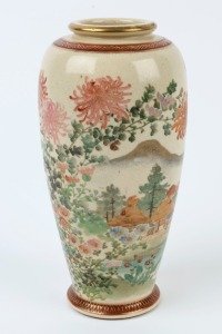 SATSUMA Japanese pottery vase with village landscape scene surrounded by flowers, Meiji period, 19th/20th century, seal mark to base, 22.5cm high
