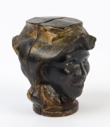 An antique American double-sided cast metal moneybox with African-American faces, 19th/20th century, ​​​​​​​8cm high - 3