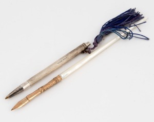 An antique mother of pearl and gold tipped writing stylus, together with a sterling silver pocket pen, 19th and 20th century, (2 items), the larger 16cm long