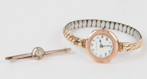 An antique 10ct gold bar brooch, set with aquamarine (2.8 grams); together with a vintage wristwatch in 9ct gold case, 19th/20th century, (2 items)