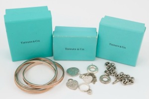 TIFFANY & CO. branded silver bangle set, bracelet, ring, necklace and four assorted pendants, all stamped "TIFFANY & CO. 925", with branded boxes and pouches, (7 items), ​​​​​​​130 grams total