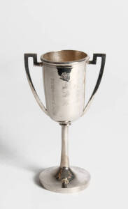A Chinese silver two handled trophy cup, circa 1920, with Chinese inscriptions to one side and to the base, 14.3cm high