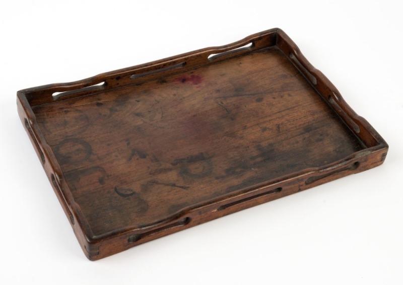 An antique Chinese carved rosewood serving tray, Qing Dynasty, 18th/19th century, 35.5cm across the handles