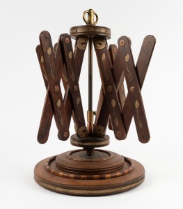 An antique yarn spinner, stained beech with incised and gilded floral decoration, plus barber pole moulded decoration, 19th century, ​​​​​​​40cm high