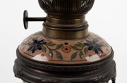 An antique oil lamp with floral porcelain stand and metal mounts with single burner (later shade and chimney), circa 1900, 72cm high overall - 2