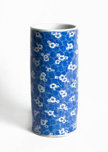 A Chinese blue and white cracked ice and prunus sleeve vase, 20th century, 30cm high