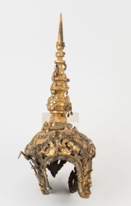 MAKUTA gilded headdress on timber stand, Southeast Asian origin, 46cm high, 93cm high overall