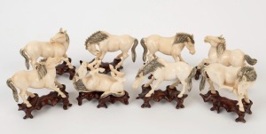 Group of eight Chinese carved ivory horse statuettes on carved wooden bases, early to mid 20th century, each approximately 8cm high