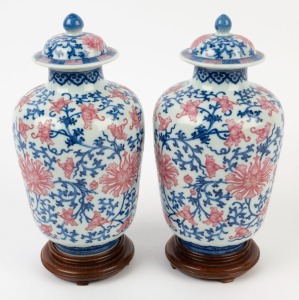 A pair of Chinese blue and white porcelain vases with famille rose enamel decoration, 19th/20th century, Guan Xu mark to bases, 27cm overall