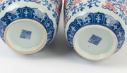 A pair of Chinese blue and white porcelain vases with famille rose enamel decoration, 19th/20th century, Guan Xu mark to bases, 27cm overall - 2