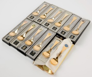 GEORG JENSEN set of twelve enamel and gilt Danish silver year spoons, 15cm long, 500 grams total