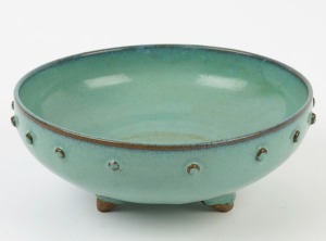 An antique Chinese bowl with turquoise glaze on three feet, in the Ming style, 10cm high, 24cm diameter