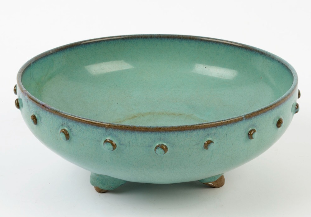 An antique Chinese bowl with turquoise glaze on three feet, in the Ming ...