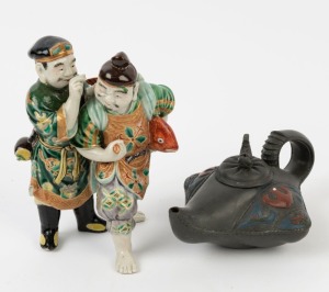 Xizheng pottery teapot, and a Chinese porcelain figural group, 20th century, (2 items), the statue 19cm high