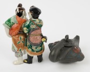 Xizheng pottery teapot, and a Chinese porcelain figural group, 20th century, (2 items), the statue 19cm high - 2