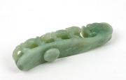 A Chinese carved jade toggle amulet with dragon decoration, 19th/20th century, 12cm long - 2