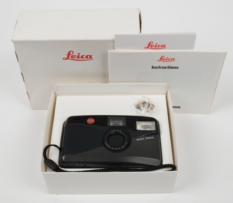 LEITZ Leica Mini Zoom compact camera [#1988892], c. 1993, with Vario-Elmar 35-70mm f4-7.6 zoom lens, in maker's box with instruction booklet, registration and warranty cards, battery, and strap.