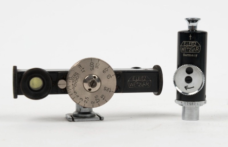 LEITZ: One c. 1930s FOKOS black and nickel rangefinder with scale in meters, together with one APDOO self-timer shutter release. (2 items)