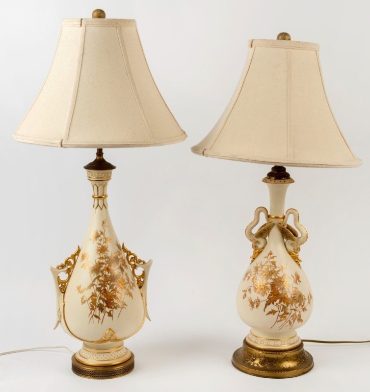 Two ROYAL WORCESTER English porcelain table lamps with shades, the larger 85cm high overall