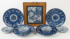 Four blue and white Chinese porcelain platters and four bowls, plus a framed plaque, 20th century, (9 items), the plaque 39 x 34cm overall