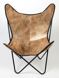 A reproduction sling chair, black metal with cow hide covering, 100cm high, 83cm wide, 71cm deep.