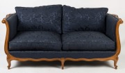 A&nbsp;four seater sofa in the French antique style, patinated beech frame and royal blue fabric with scroll arms and cabriole legs, 79cm high, 184cm wide, 92cm deep