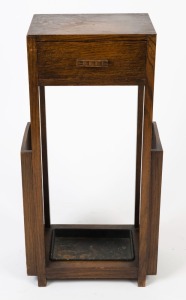 An Art Deco stained oak umbrella stand with single drawer and drip tray to the base, 77cm high, 39cm wide, 24cm deep