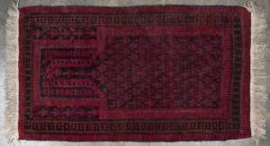 Hand-knotted black and red prayer rug, together with a small hall runner, (2 items), 135 x 77cm and 195 x 62cm.