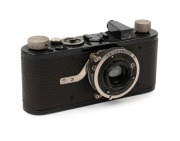 LEITZ: Circa 1929 Leica I Model B [#13297] with rim-set Compur&nbsp;shutter [#2008474], Elmar 50mm f3.5 lens, and round-base accessory shoe. This is the 143rd camera in a total production run of just&nbsp;1072 units.