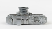 CANON: NS rangefinder camera [#10880], c. 1941, with Nikkor 50mm f3.5 lens [#501380] in shutter #1917. Featuring pop-up rangefinder and 'Canon Seiki-Kogaku' engraving on top plate. With Canon ERC with straps. [NB: While the vulcanite body covering has det - 4