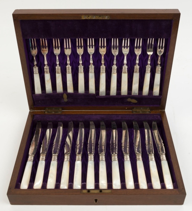 An antique English fruit cutlery set with mother of pearl handles by Walker & Hall, housed in original walnut canteen, 19th century, the canteen 31cm wide