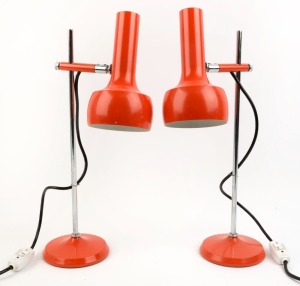 A pair of vintage orange metal and chrome adjustable lamps, circa 1970, ​​​​​​​53cm high